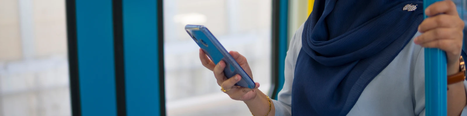 holding a mobile phone
